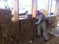 Frank master baler inspects and adjusts the apprentices' work