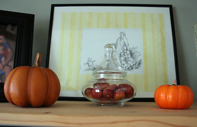Mini pumpkins in apothecary jar