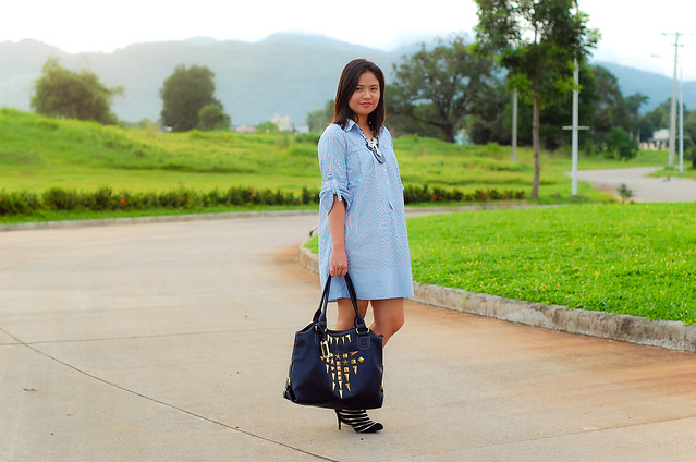 Pin stripe dress, gold stripe booties and gold studded purse