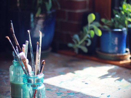 brushes, table, plants, window
