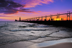 "Sunset silhouette"   Grand Haven Lighthouse - Grand Haven , Michigan by Michigan Nut