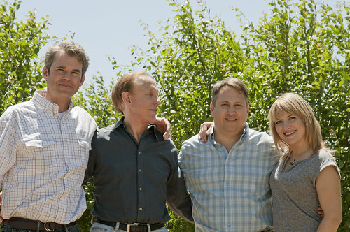 Members of the Wilbur family (from left to right) John Friend, Rick Wilbur, Richard Wilbur and Emily Friend, gather on their farmland in California’s Sacramento Valley. As the owners and operators of the Wilbur Packing Company, they have had great success exporting prunes and walnuts to international markets with assistance from the Foreign Agricultural Service’s (FAS) export programs. 