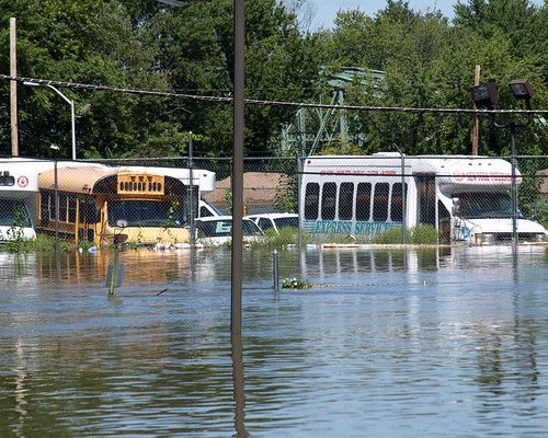 Hurricane Irene Aftermath: Submerged Jitney Buses in Paterson, New Jersey by jag9889