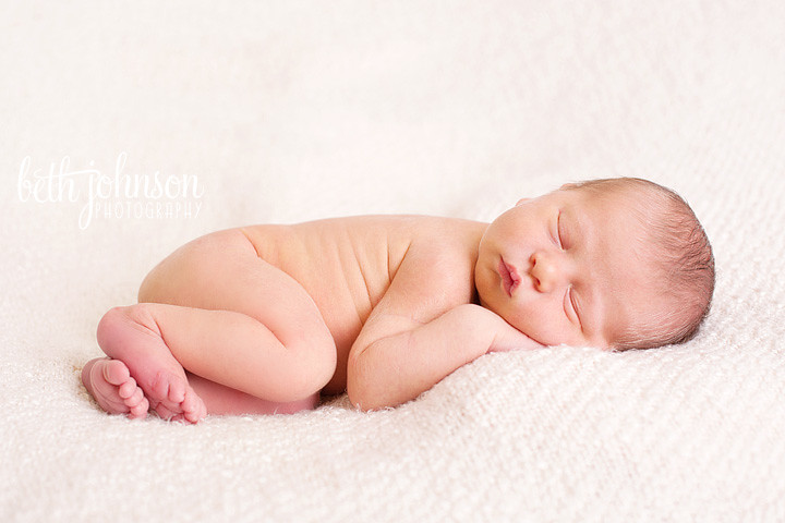 newborn baby in tallahassee on white blanket studio photography