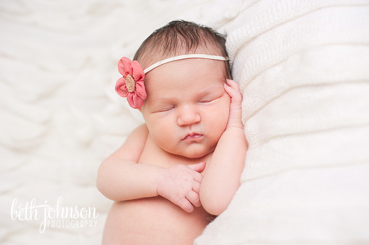 newborn baby girl with pink flowered headband tallahassee