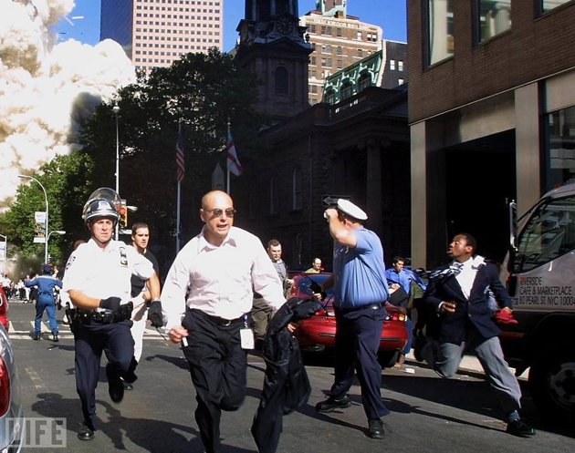 men running from 9/11