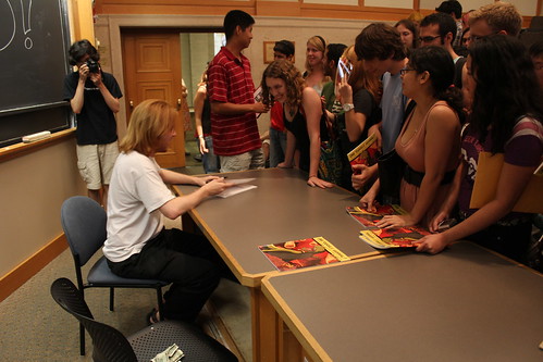 Fans crowding around Zach during a signing