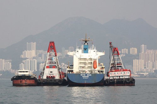 Mid-stream cargo unloading of container ship 'Methi Bhum' in Hong Kong
