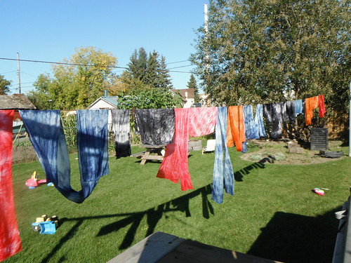 Beautiful silk scarves drying on the line