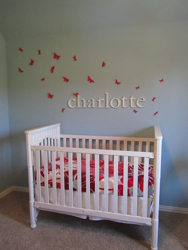 Butterflies, letters and crib.