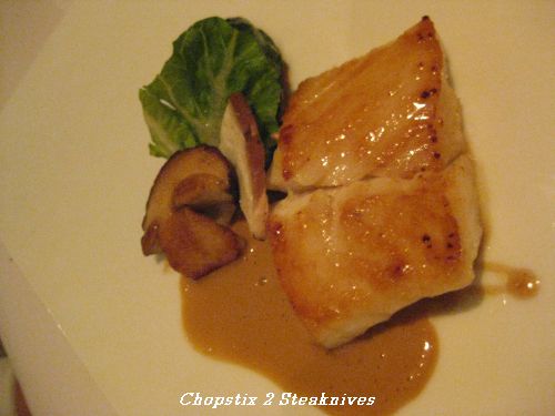 Fillet of turbot with braised baby gem lettuce, leeks and cep sauce