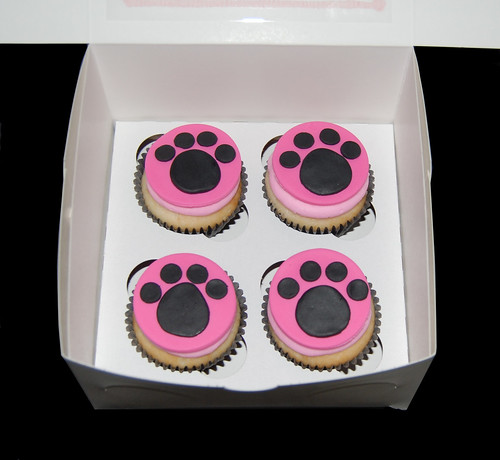 pink and black paw print cupcakes