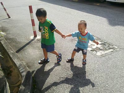 Boys holding hands
