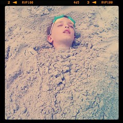 Eli sleeping in sand