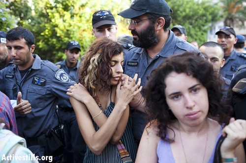 Police forces evacuating the new squatted building in Tel-Aviv's center, Israel, 23/8/11