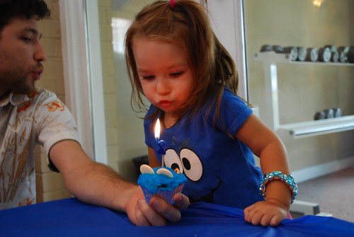 Blowing out her candle