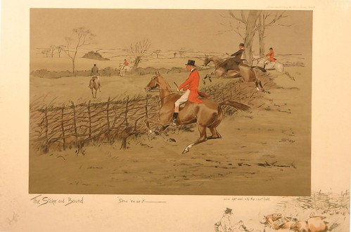 The Stake and Bound, by Snaffles, which shows the hunt jumping a stake-and-bound fence.