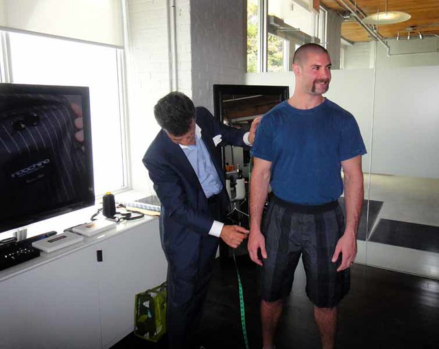 Toronto Maple Leaf Mike Brown being measured for his Indochino suit