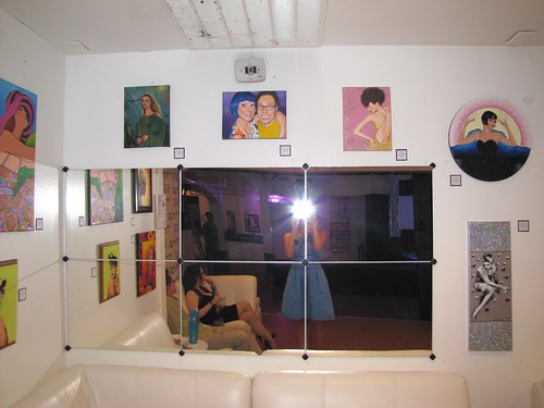 paintings over the mirror