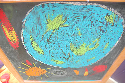 odin's interpretation of "Here Comes Science" in chalk.