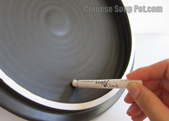 [photo-rub lead test swab on ceramic clay]