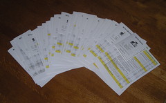 A stack of brevet cards and cue sheets