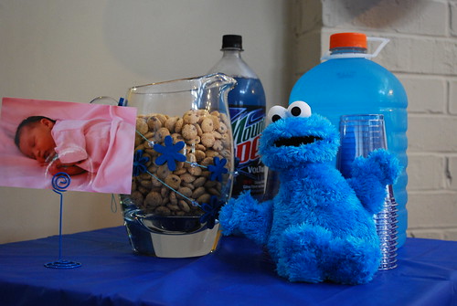 Pitcher of cookies, cups, and blue drinks
