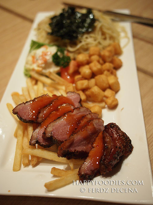 A plateful smoked Duck with Pasta