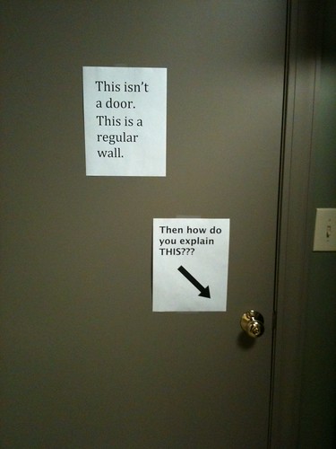 This isn't a door. It's a regular wall. (Response:) Then how do you explain this???