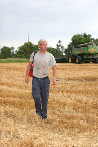 Combine parked for the evening Andreas gets ready to head home.