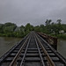 Railroad over dirty looking river
