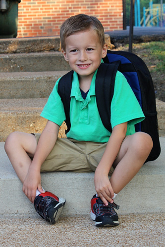 Nathan-on-stairs-of-school