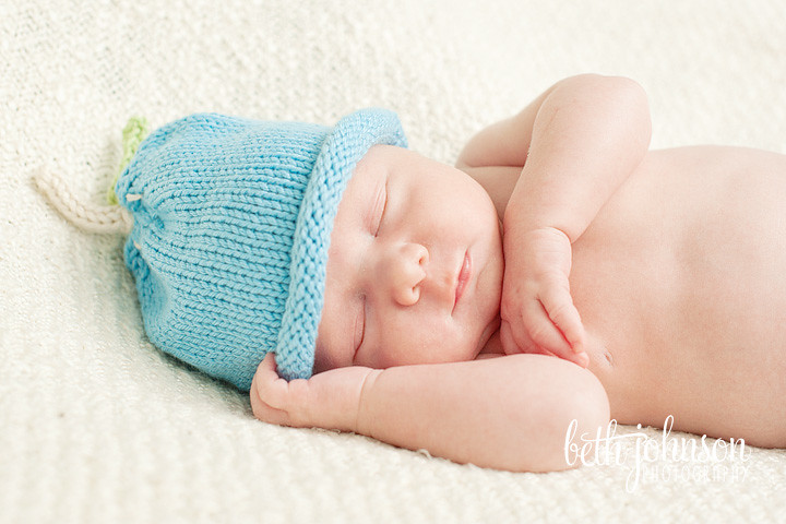 newborn baby boy in blueberry hat