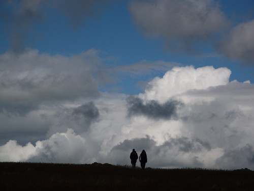 Clouds and walkers on High Street