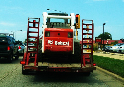 Bobcat tractor in transit.  Niles Illinois USA.  August 2011. by Eddie from Chicago