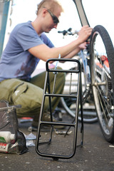 Couchsurfer Cezary putting together his secondhand bike in Sapporo, Japan