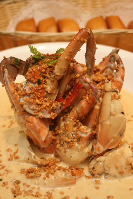 Signature Creamy Butter Crab Topped with Coconut Crumbs, served with buns