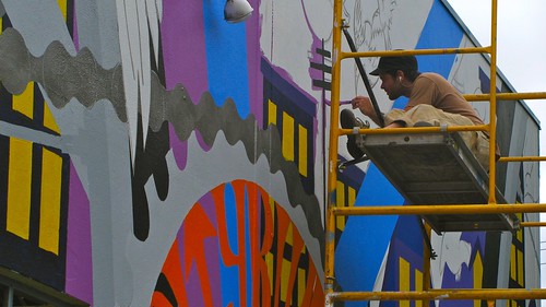 Mural being painted at the Citybikes Workers' Cooporative in Portland, Oregon.