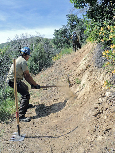A California Conservation Corps member works on a wilderness trail on Los Padres' Santa Lucia Ranger District.A California Conservation Corps member works on a wilderness trail on Los Padres' Santa Lucia Ranger District.