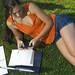 College Student studying in park with Laptop