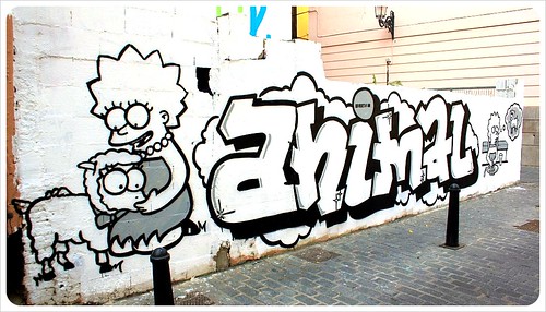 valencia street art lisa simpson save animals