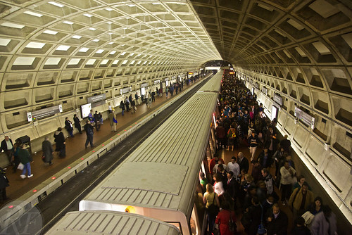 Commuters in the evening rush-hour crush in the Gallery Place/Chinatown Washington Metro station.