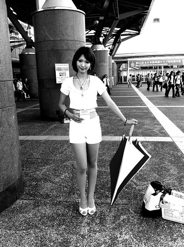 Umbrella girl outside the convention hall