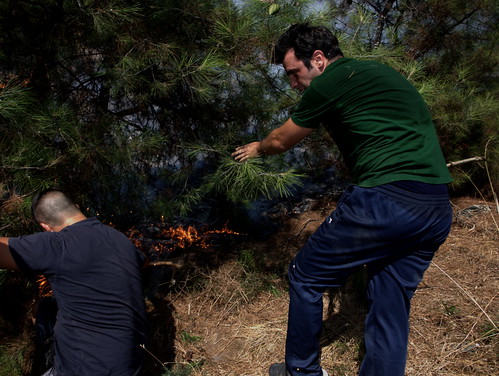 Greek volunteers fighting forest fire outside country's second largest city, Thessaloniki