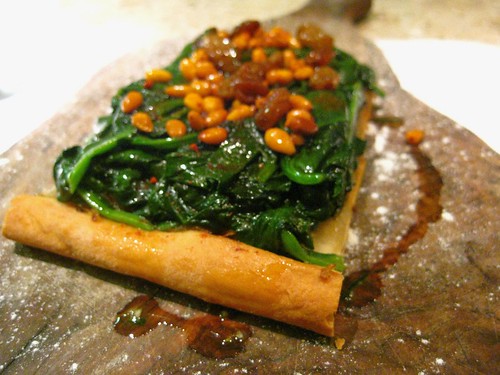 Coca Mailorquina with spinach, pinenuts and sultanas 