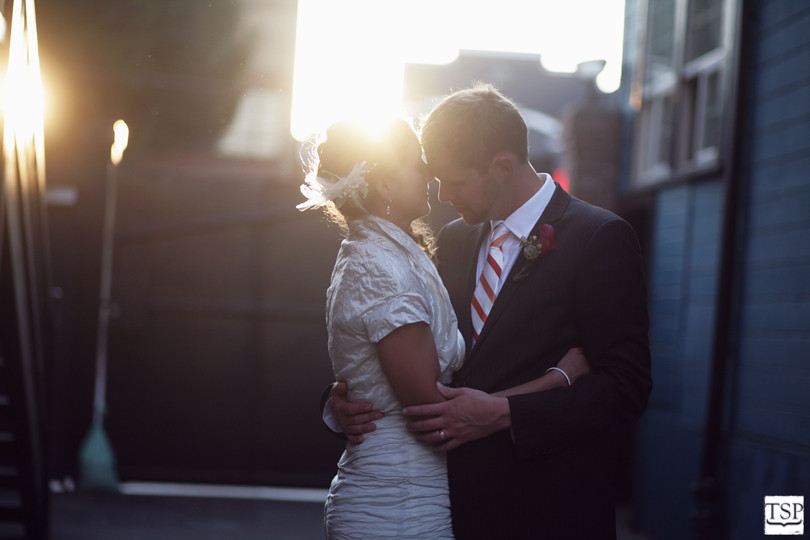 Bride and Groom Hugging in Sodo Park Sunset