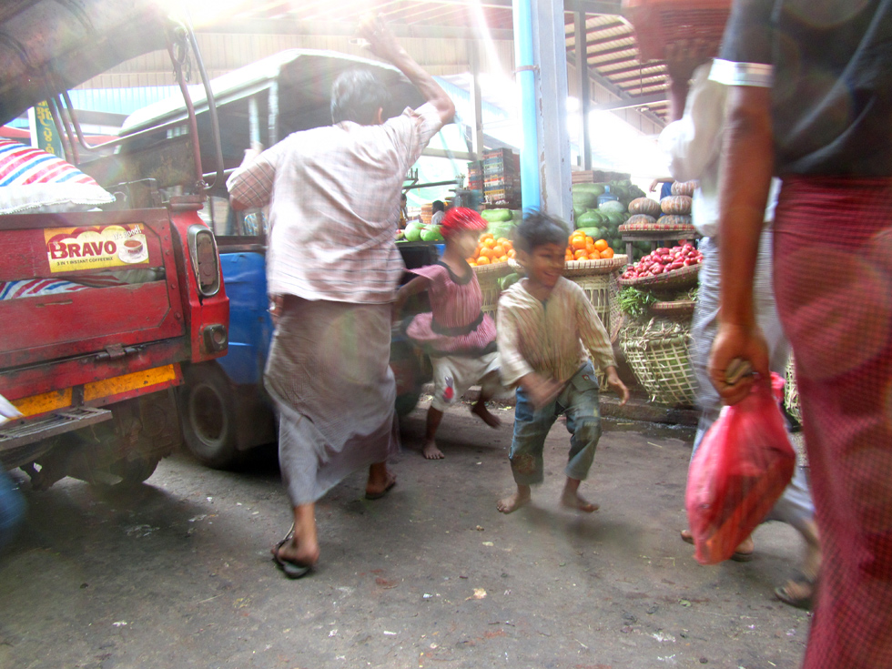 Kids Escaping a Spanking at a Burmese Market