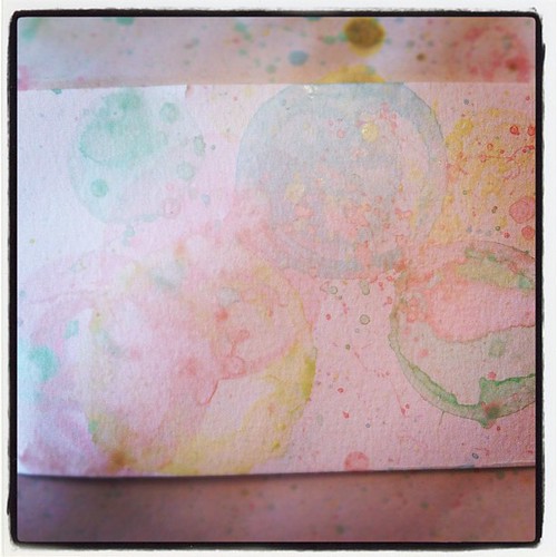 Today's art project: colored bubbles on water color paper.