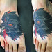 wolf on foot tattoo