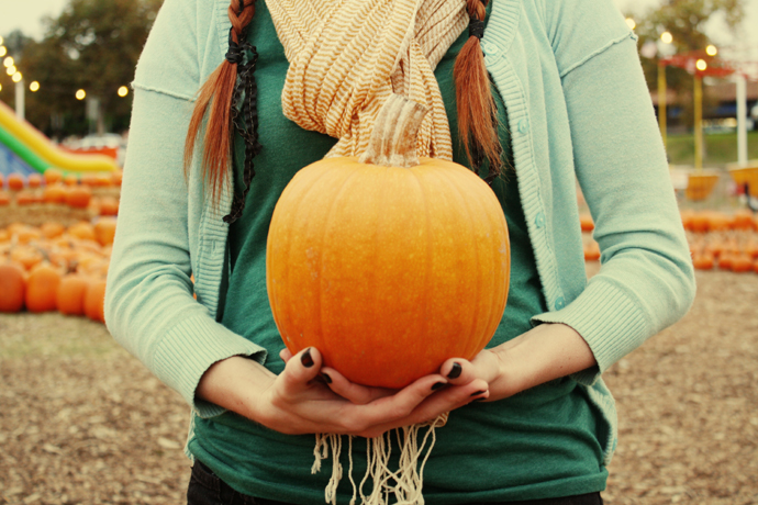 *take a photo with a pumpkin*